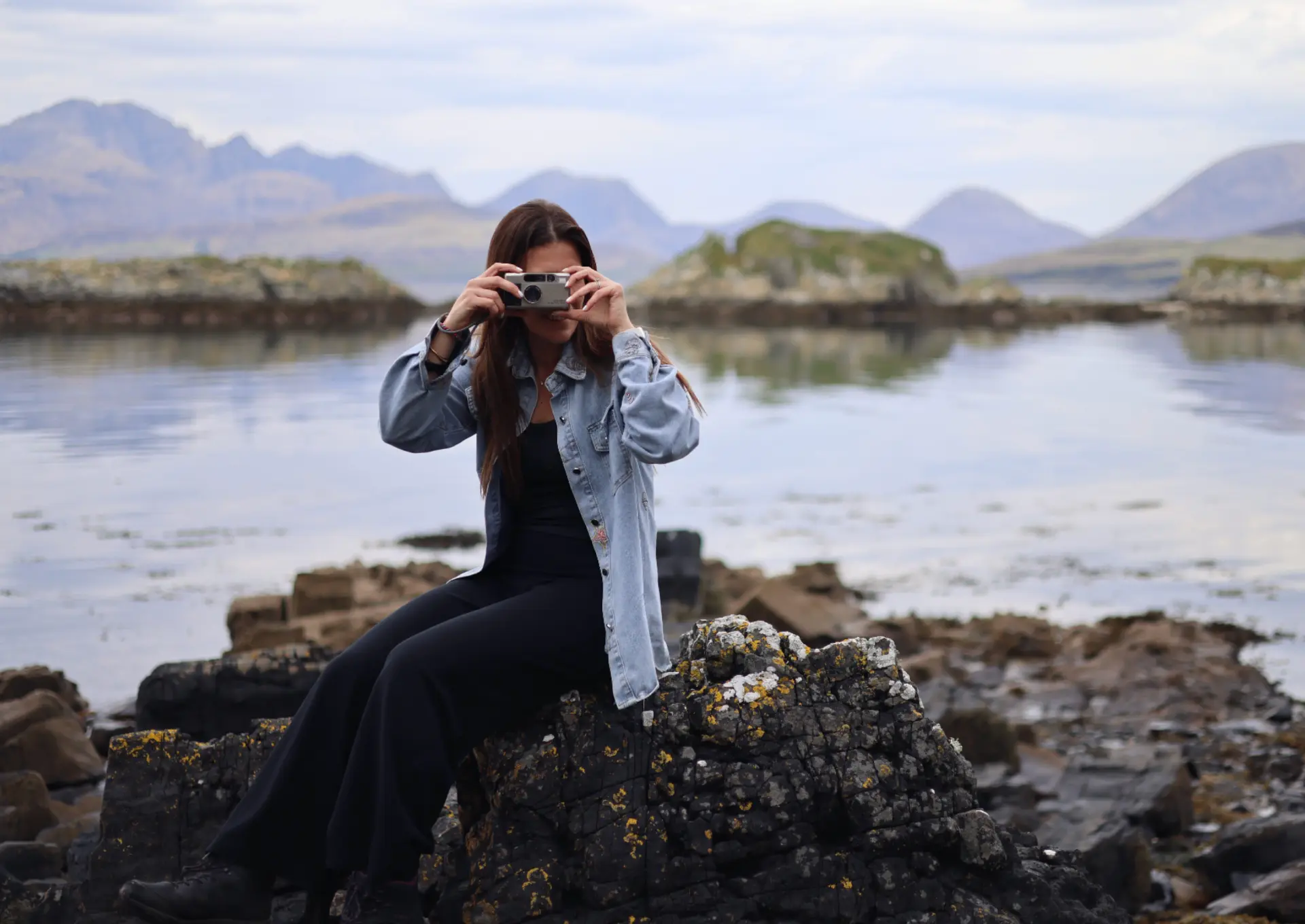 Becky Kamsky photographing by the water